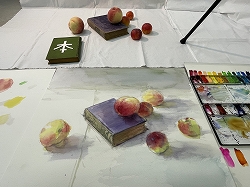 本と果物を描く